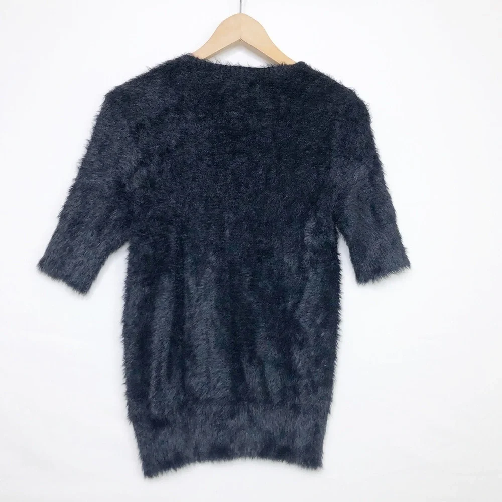 Knitted and knotted black, eyelash, scoop, neck sweater